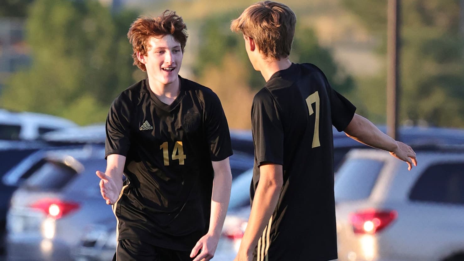 Jefferson Academy boys soccer high five