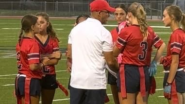 Liberty's Cody Jamison coaching flag football.