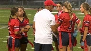 Liberty's Cody Jamison coaching flag football.