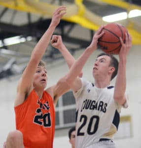 Evergreen boys hoops victorious in Paul Davis Classic opener