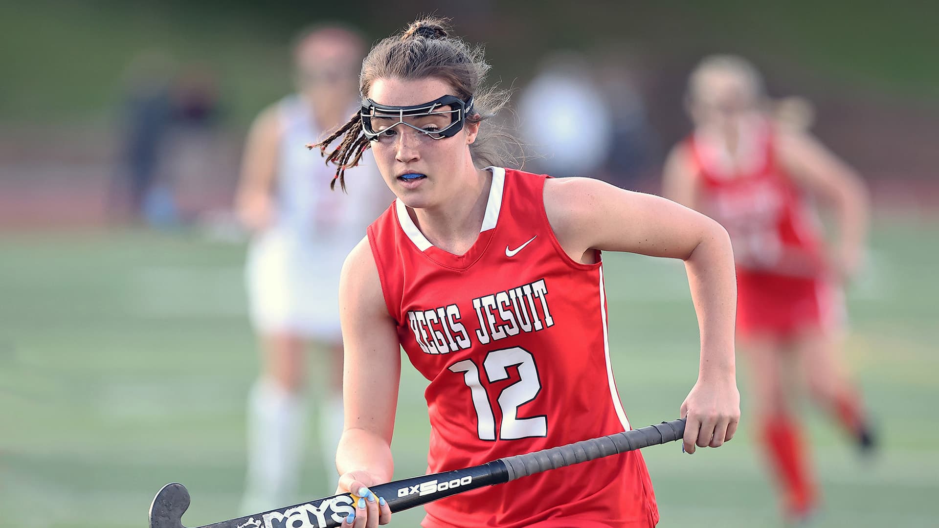 Regis Jesuit field hockey