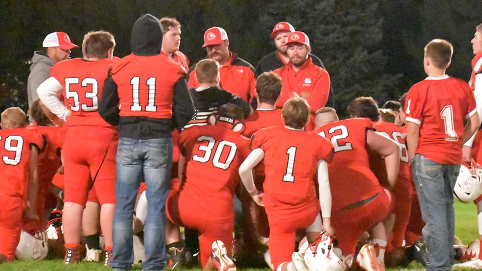Garrett Pickett coaches his team