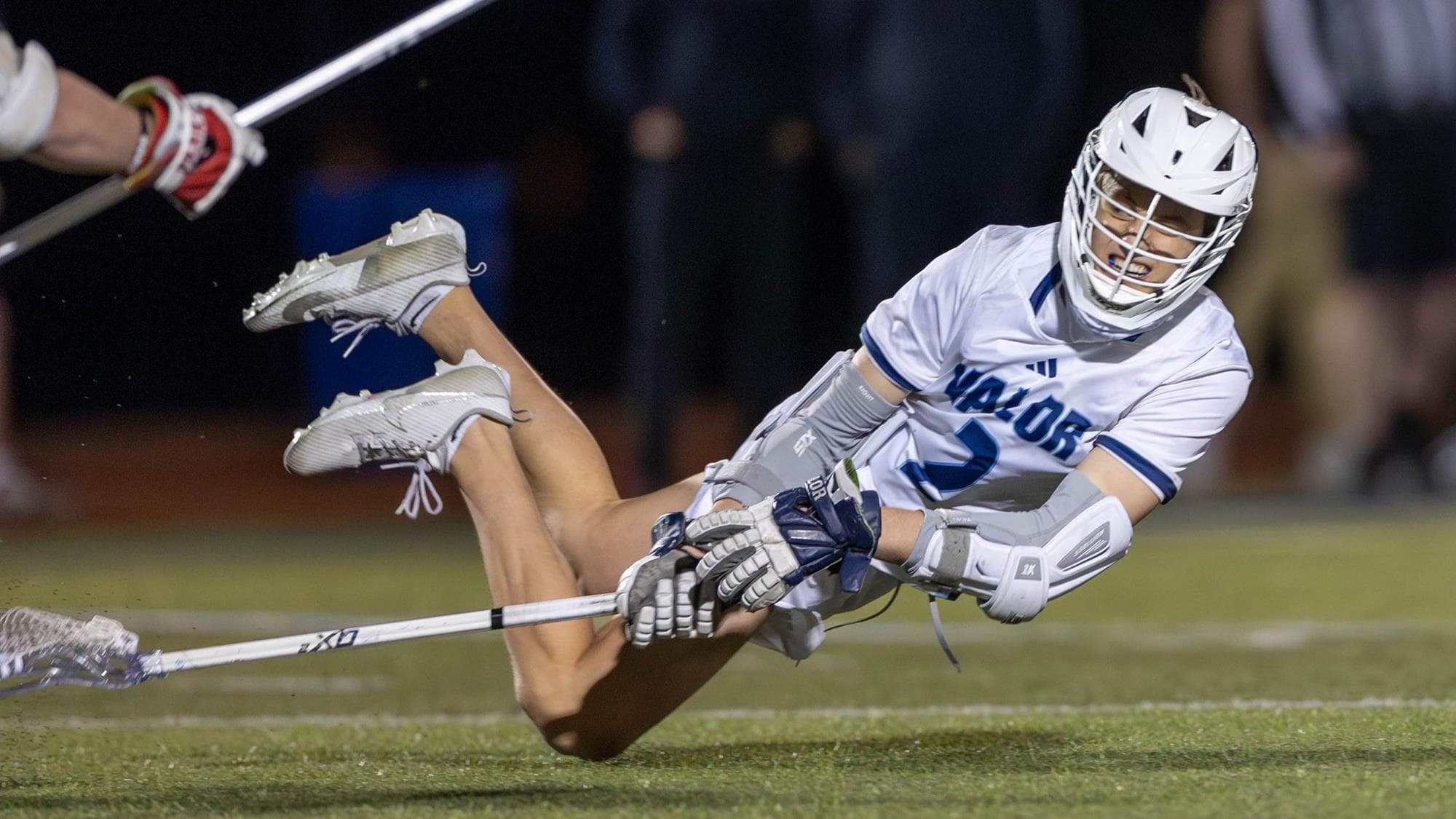 JT Cross of Valor Christian playing lacrosse