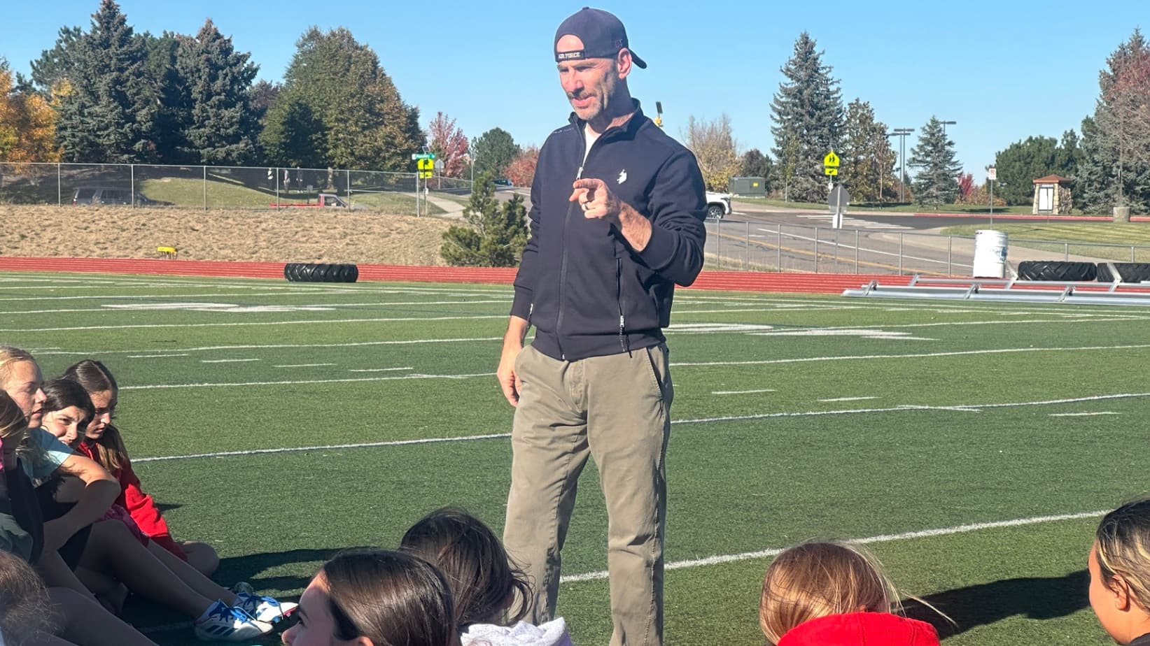 Chaparral flag football coach Lance Petrillo talks to his team