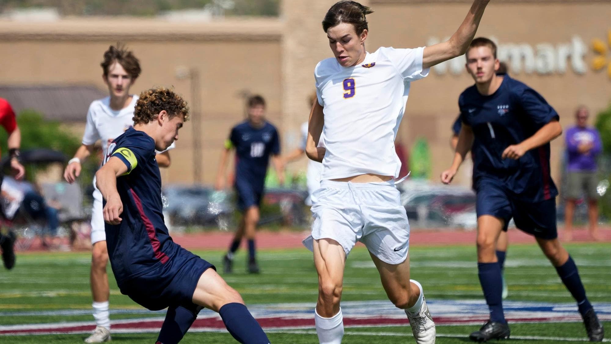 Owen Clough of Denver North playing soccer