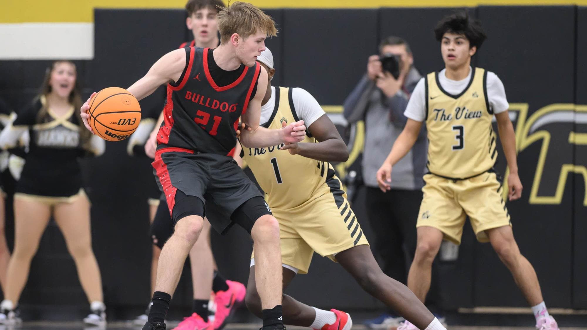 Brighton's Aiden Wanrow dribbling a basketball