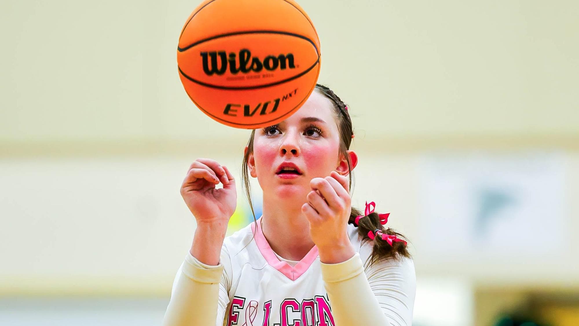 Cobelyn Wiesner of Falcon spins the ball in the air before shooting a free throw.
