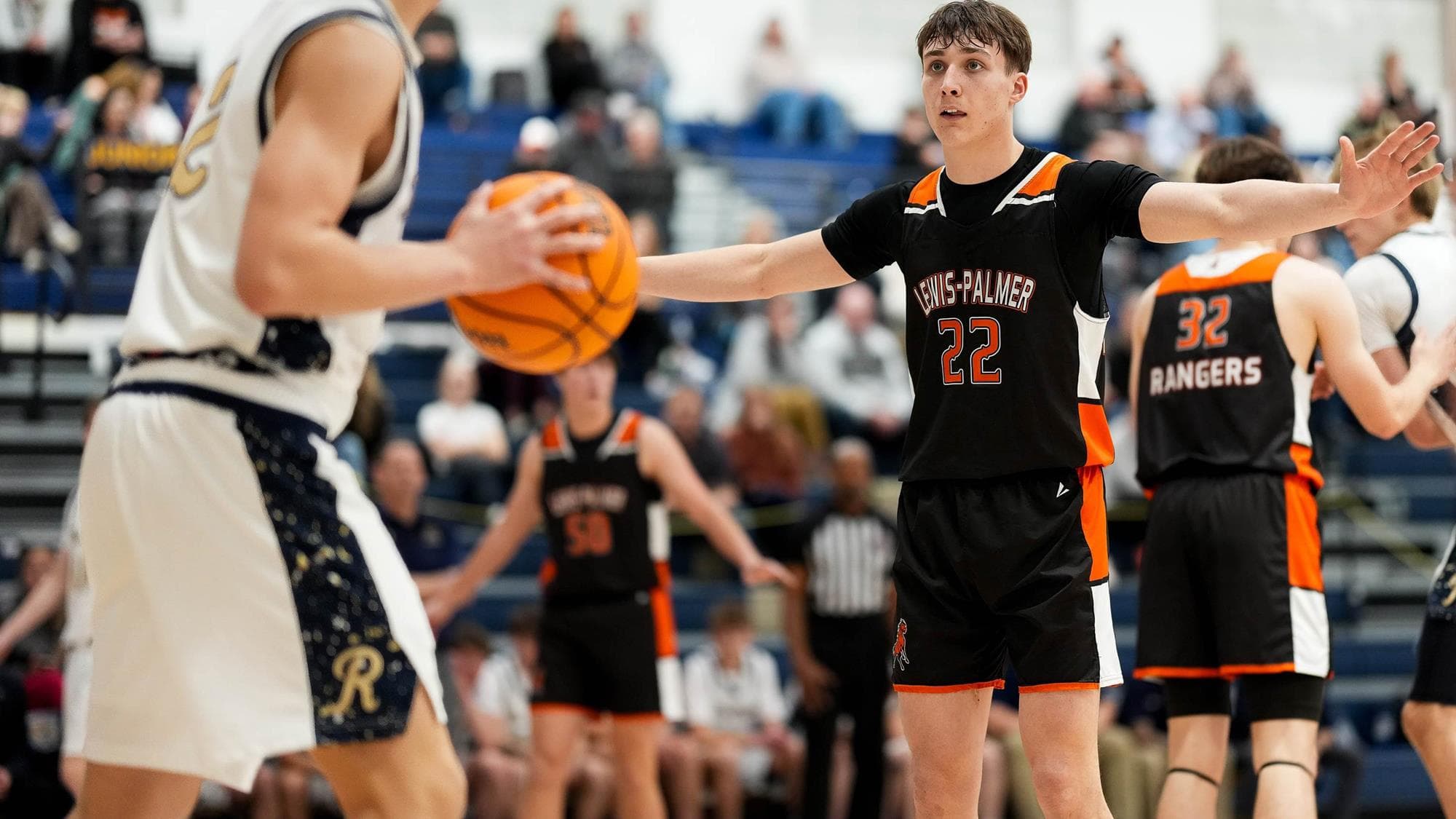 Jonas Miller of Lewis-Palmer on defense