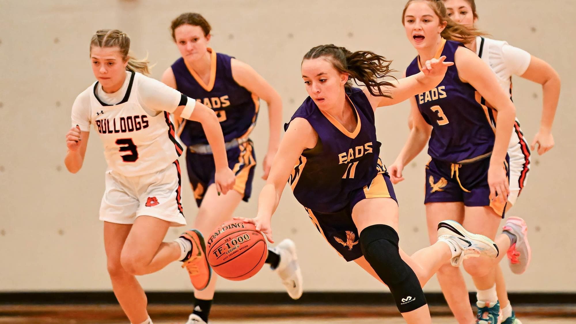 Lexi Shotton of Eads dribbling in traffic