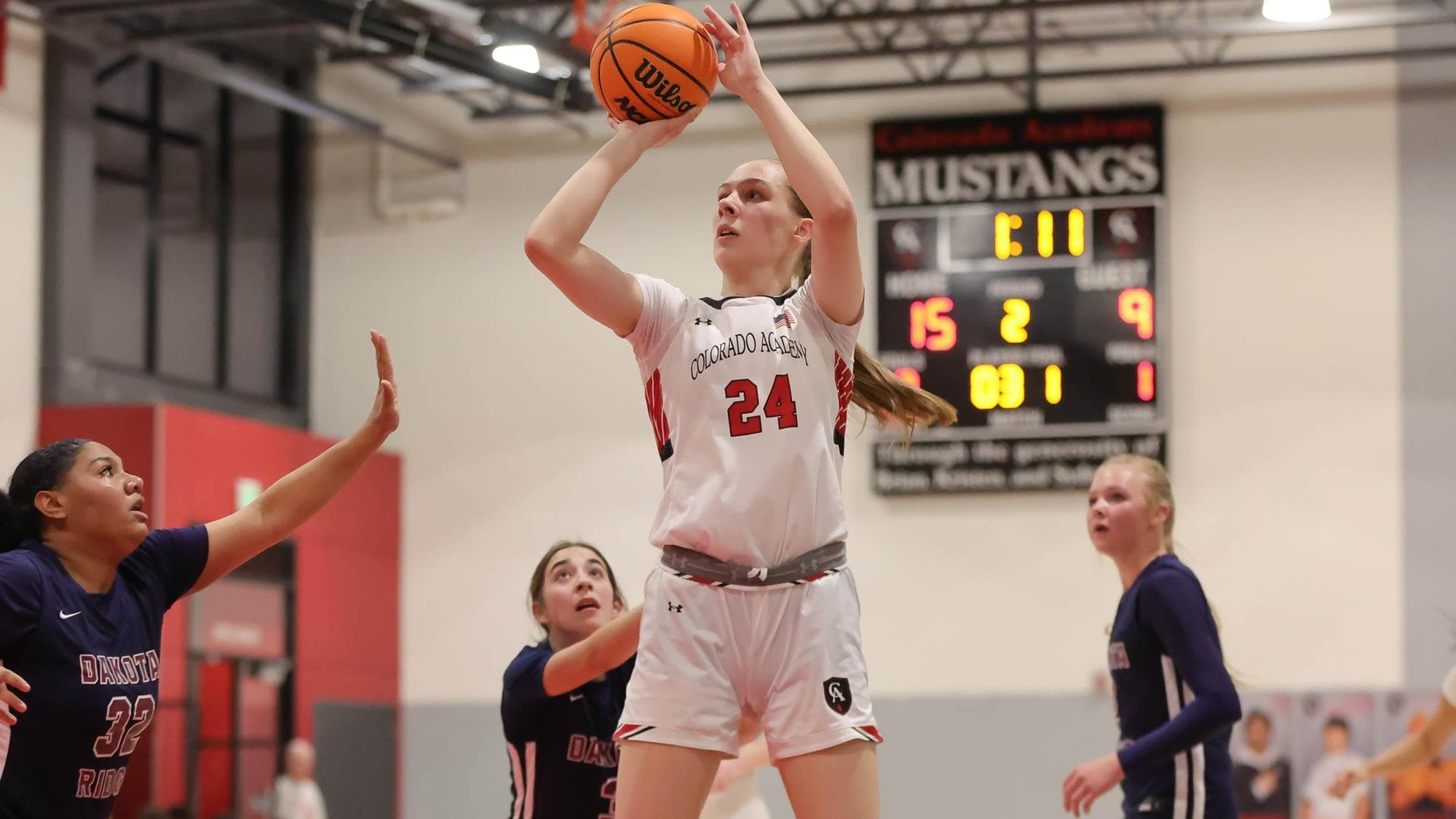 Sam Clevenger of Colorado Academy shooting the basketball