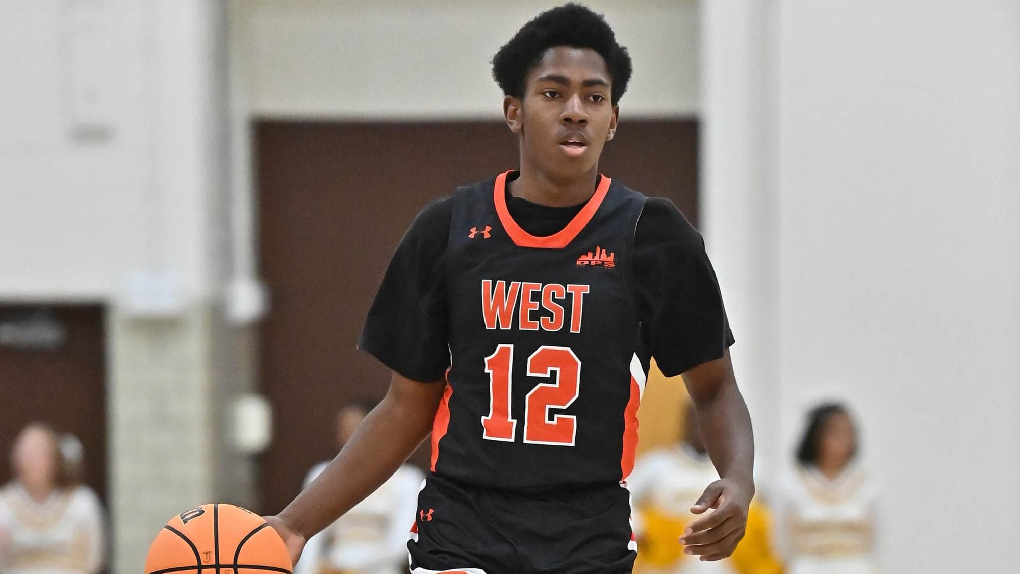 Jaheim Taylor of Denver West dribbling the basketball