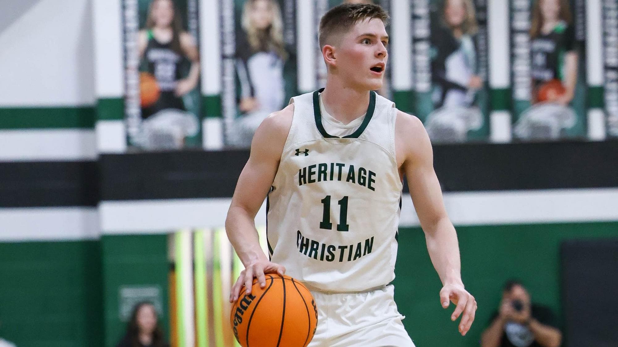 Alec Lundy of Heritage Christian playing basketball