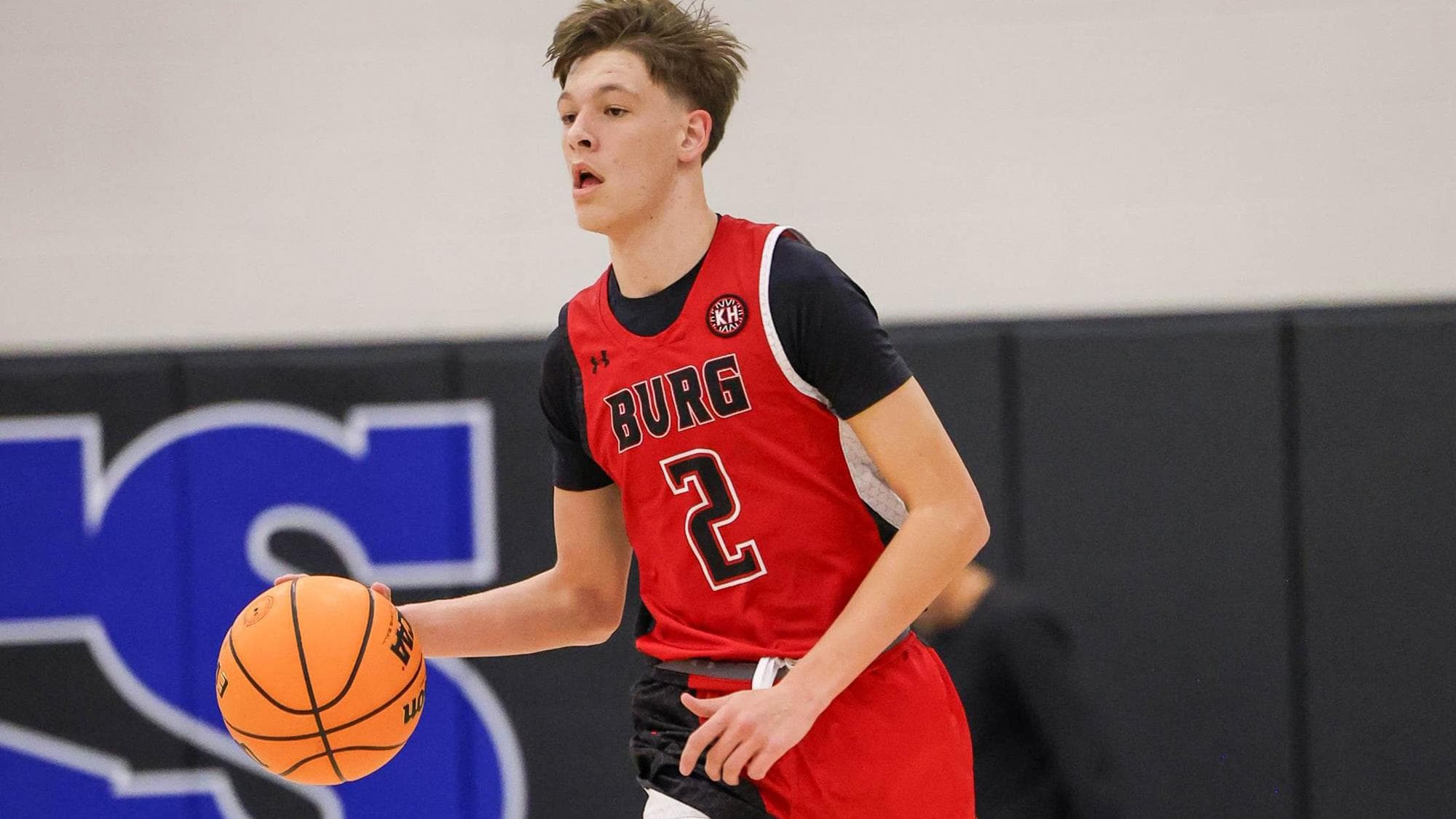 Brody Hopwood of Strasburg dribbling a basketball