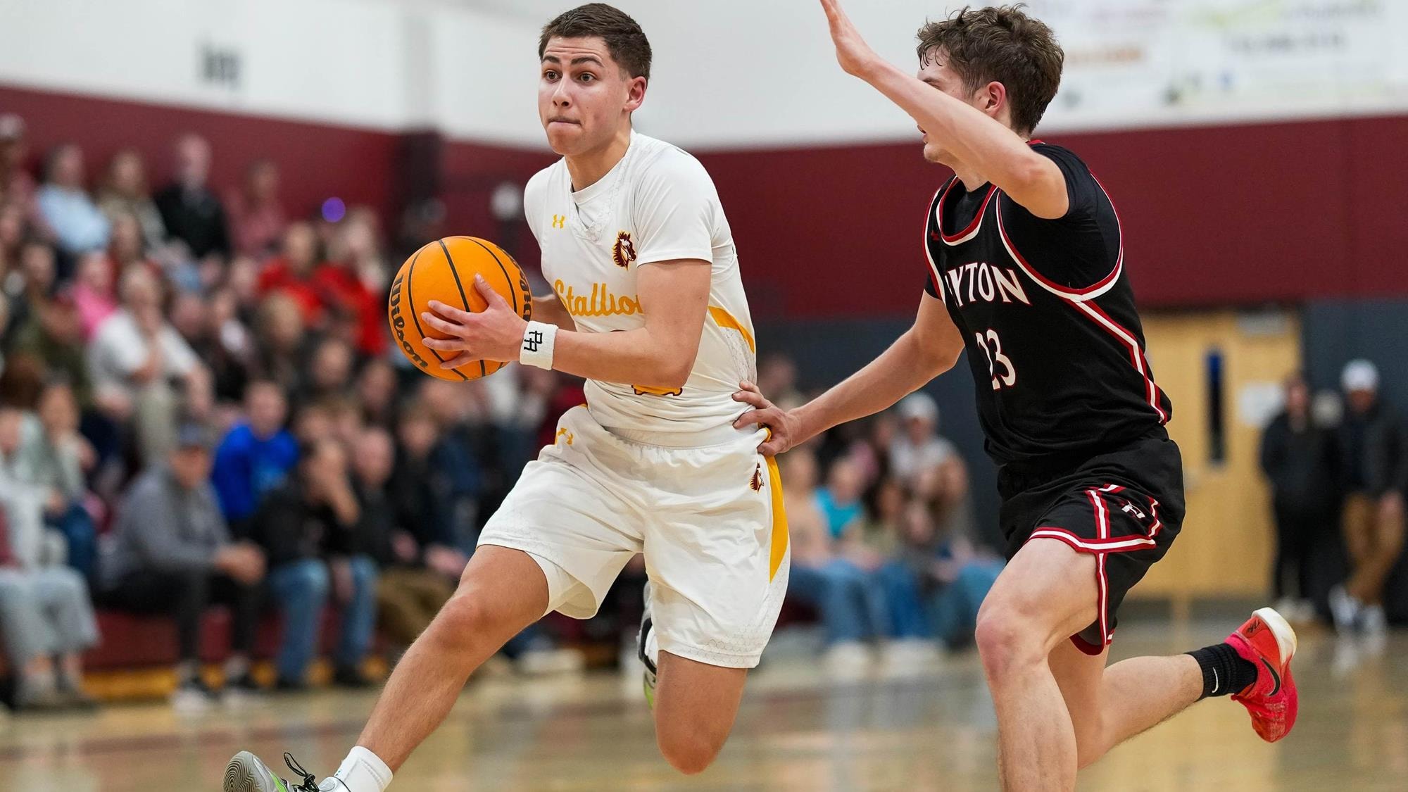 Matthew Lebron of Banning Lewis Academy driving with the basketball