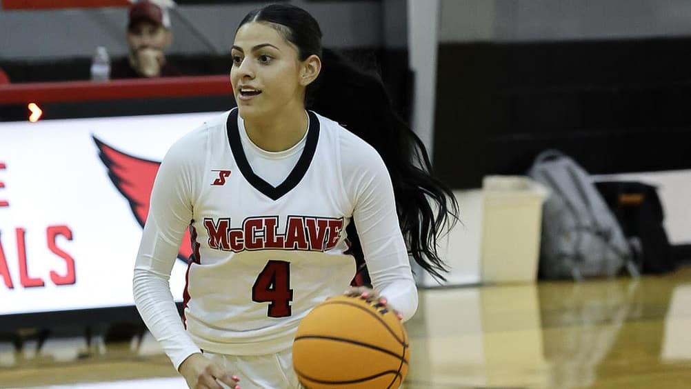 Abrielle Gomez of McClave dribbling the basketball