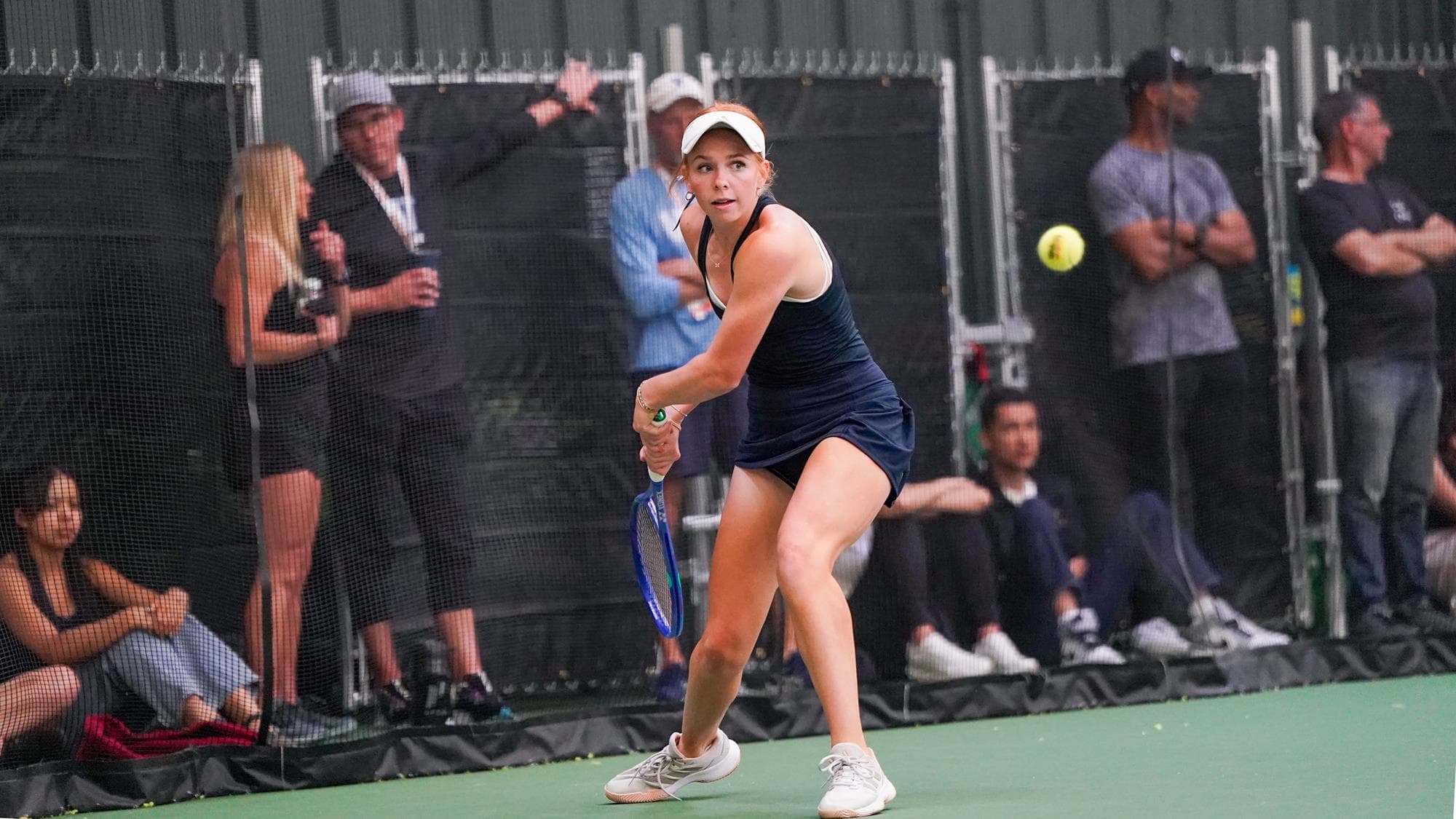 Valor Christian tennis player Caroline Daugherty hitting a backhand