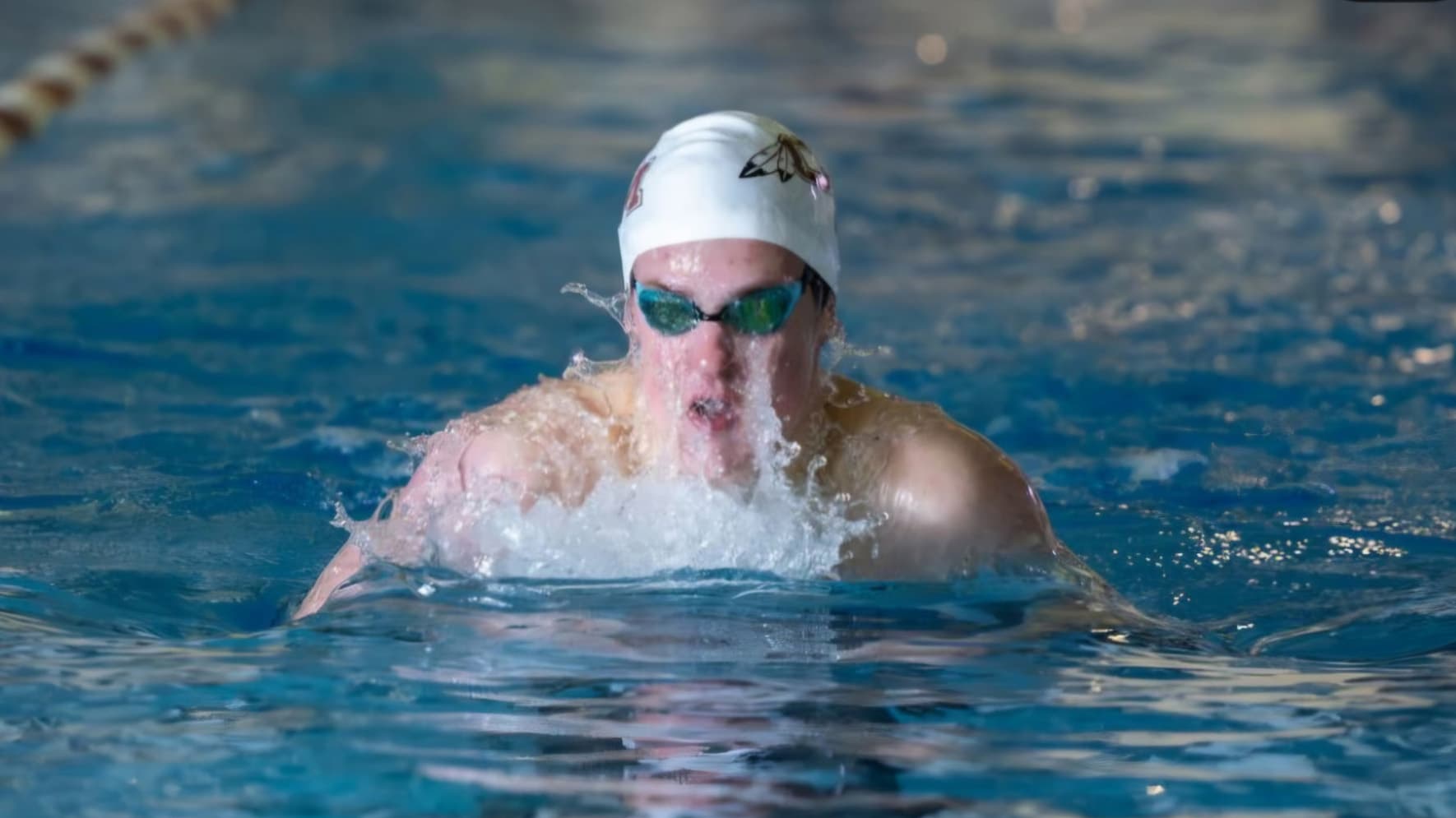 Cheyenne Mountain swimmer Barrett Kerrigan racing n the pool