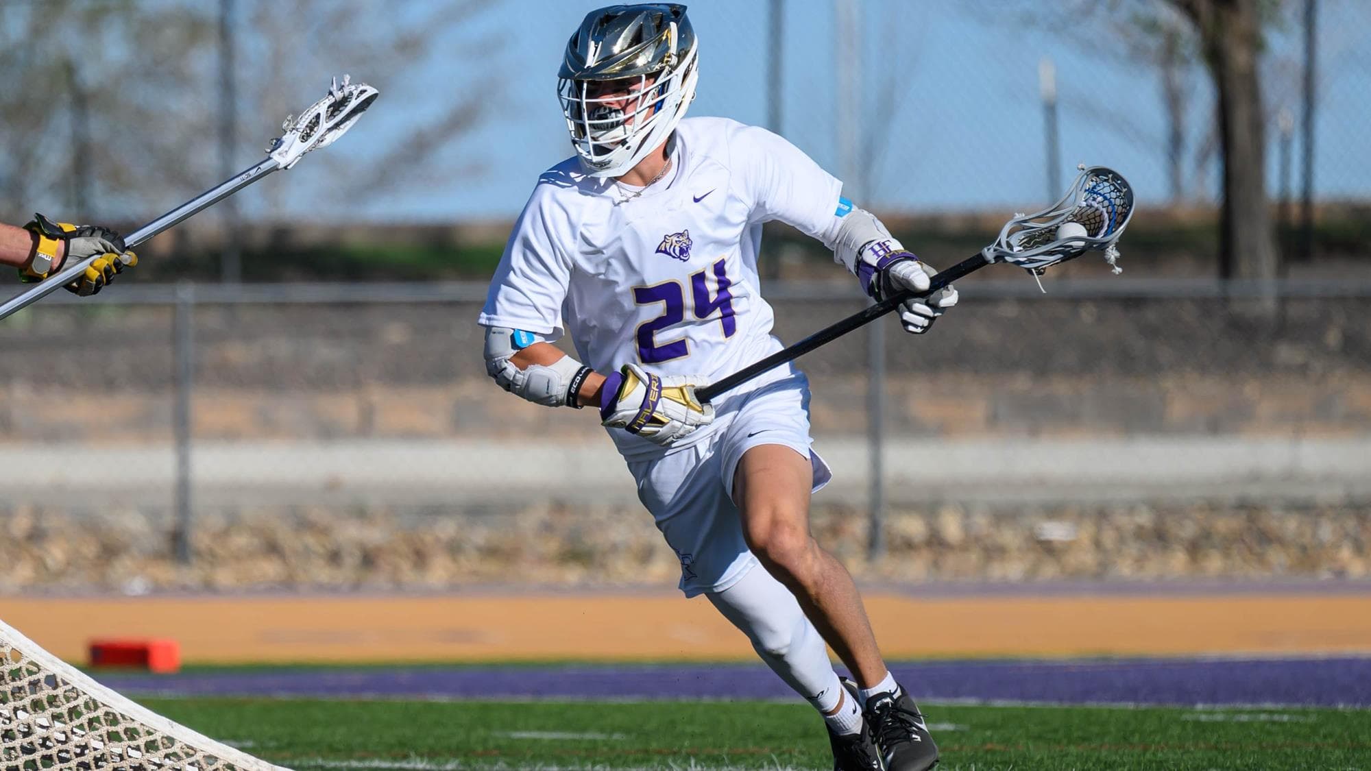 Rocco Bertagnolli of Holy Family playing lacrosse