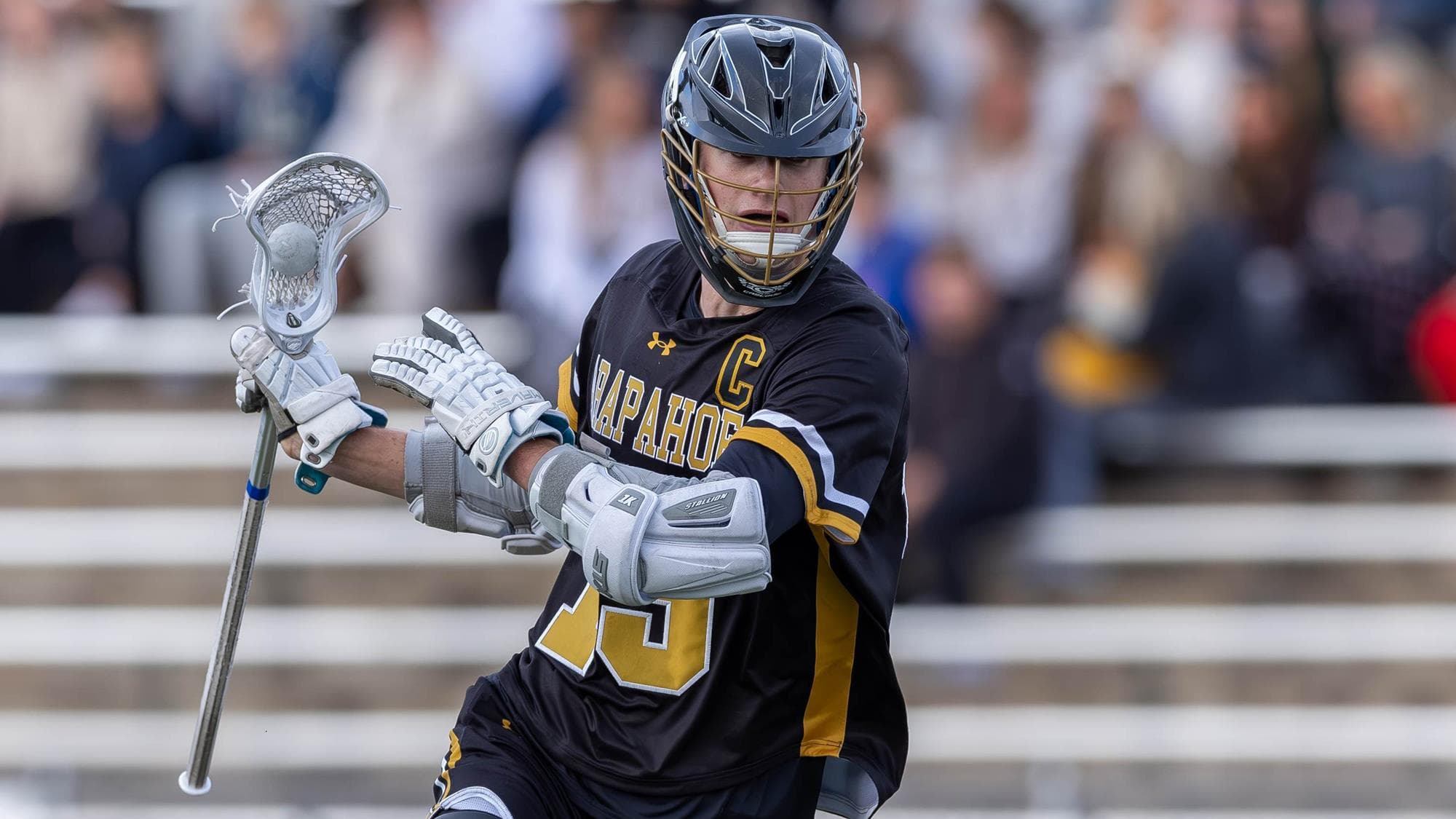 Nicholas Parker of Arapahoe playing lacrosse