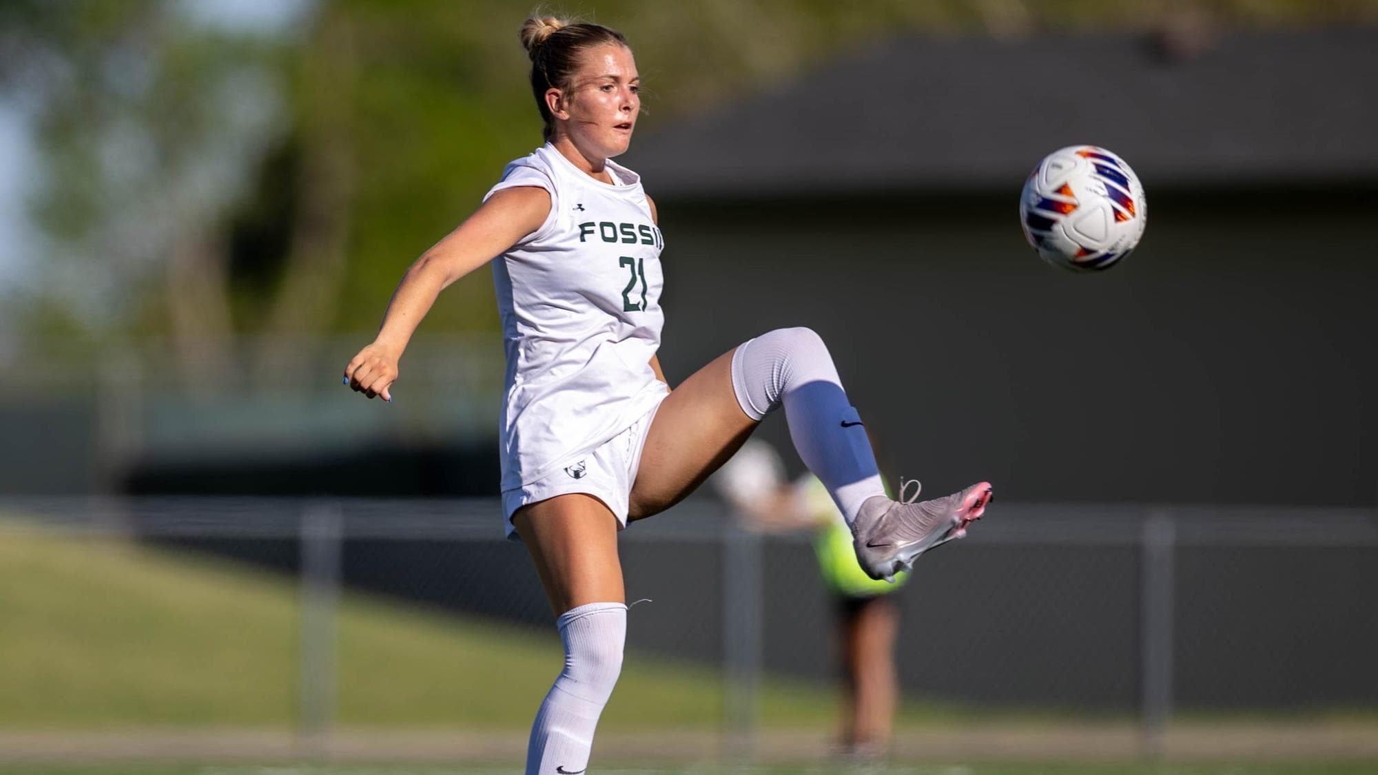 Lily Wale of Fossil Ridge playing soccer