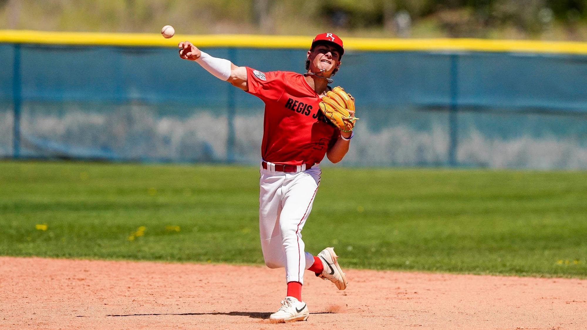 Chase Massey of Regis Jesuit throwing the baseball
