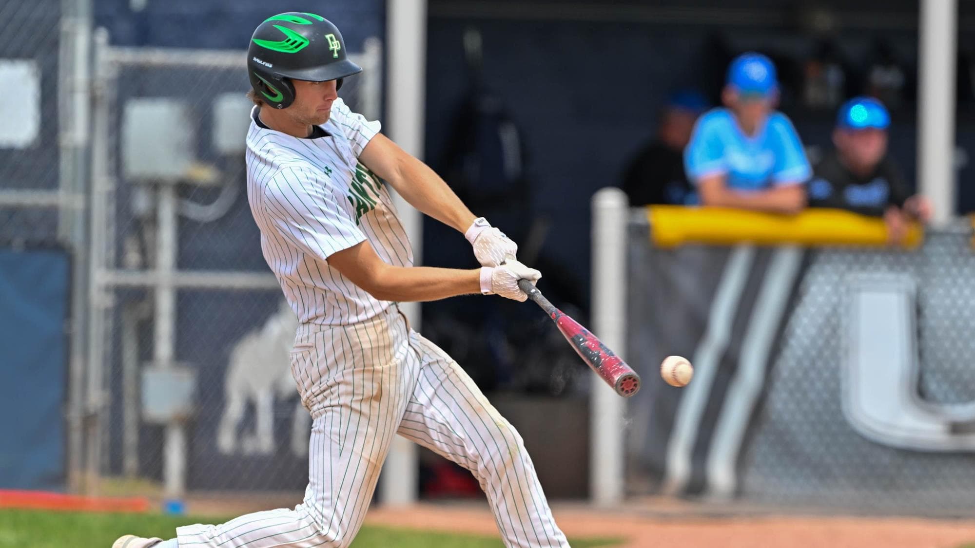 Delta's Landon Kennell hitting a baseball